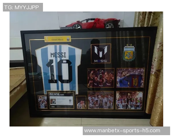 安哥拉队长赛后自豪展示与梅西交换的签名球衣将永久珍藏